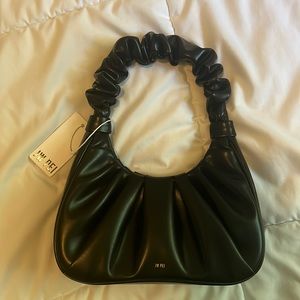JW PEI black handbag